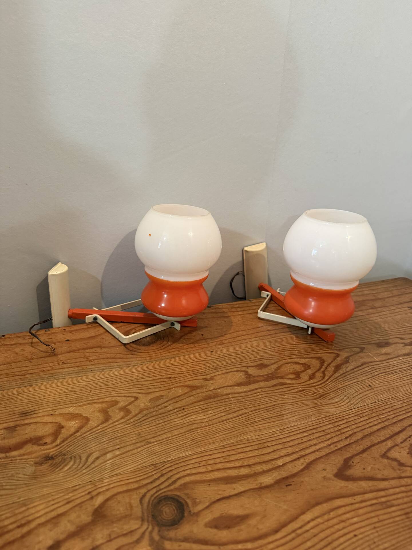Pair of Space Age design wall lights in metal and vintage opaline.