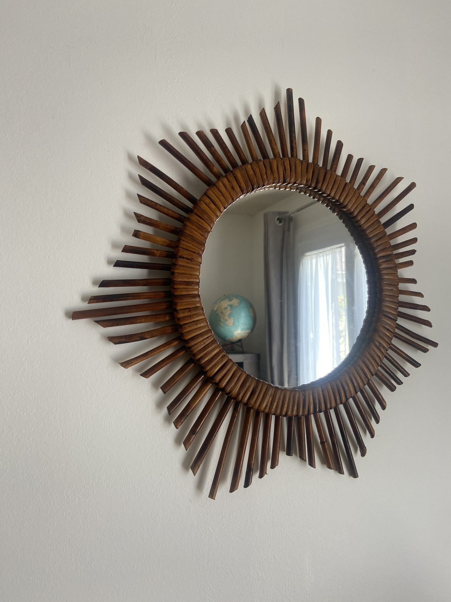 Vintage rattan sun mirror