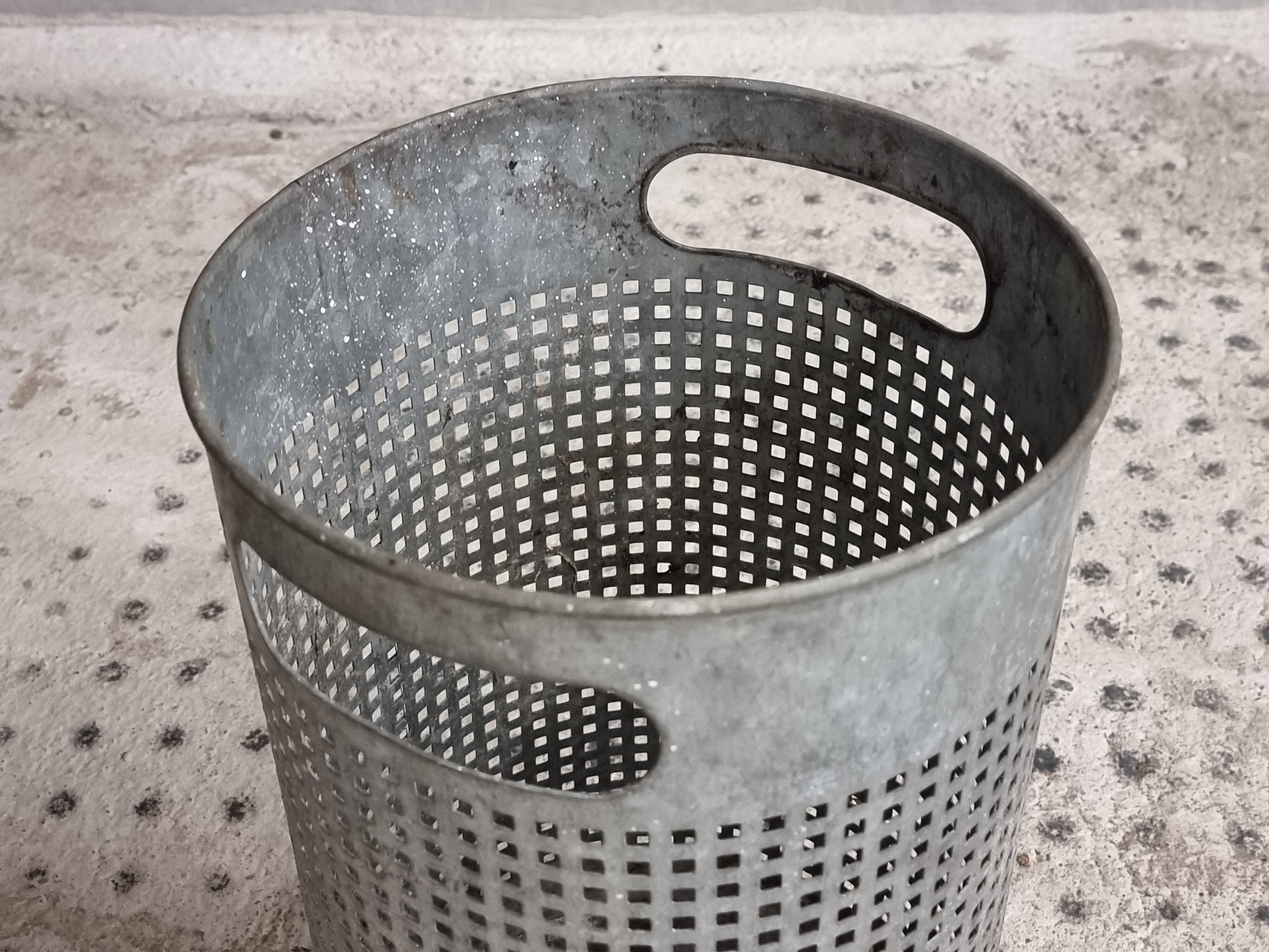 Vintage set of perforated metal waste bins