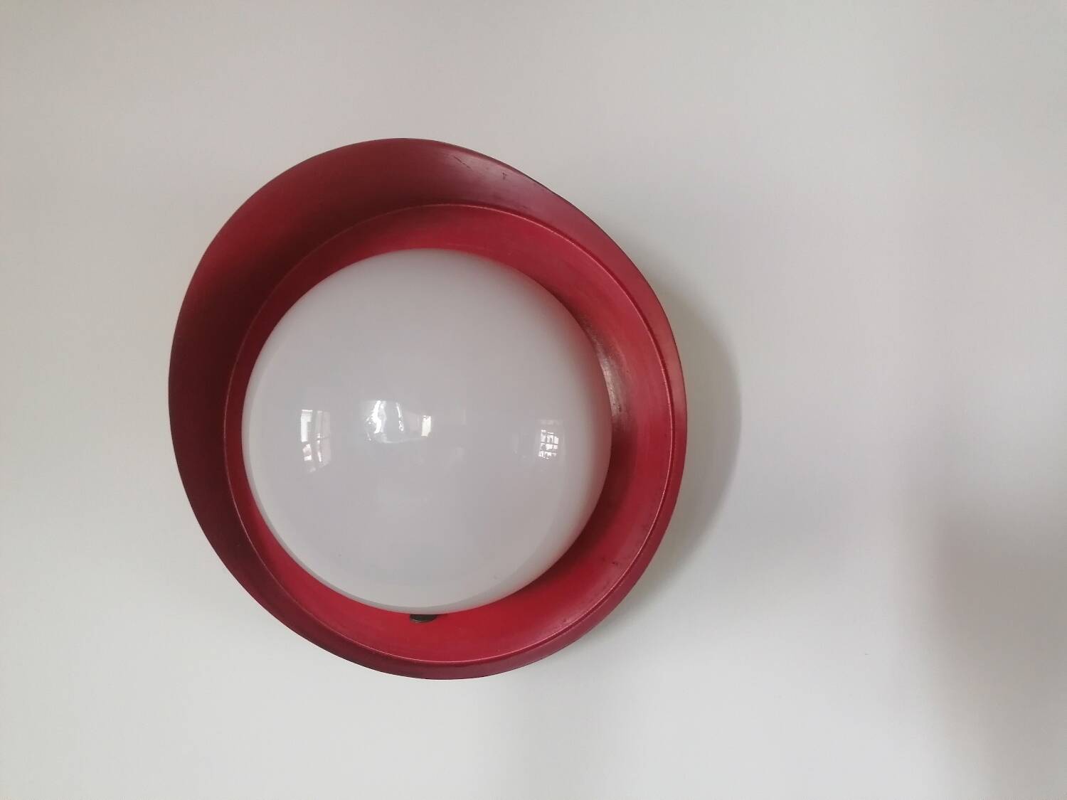 Metal wall light with glass globe
