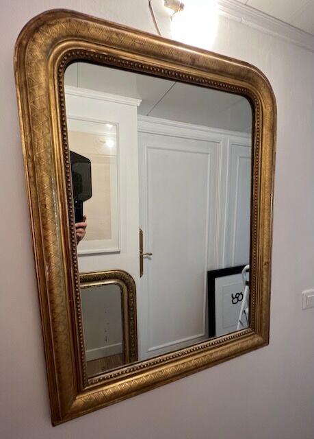 Old mirror Louis-Philippe in gilded wood