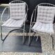 A pair of space age wire chairs