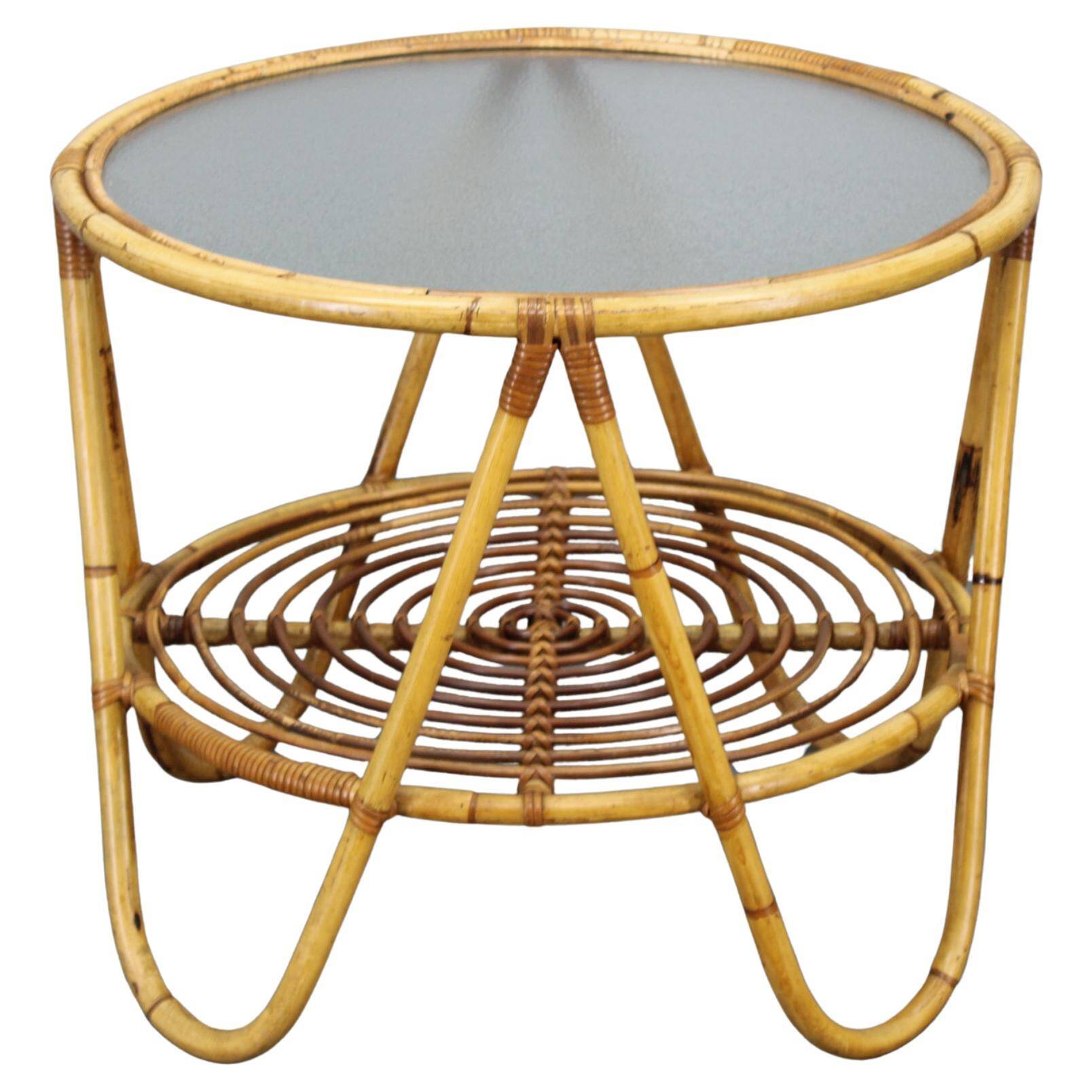 1960s Italian rattan coffee table with glass top, mid-century round design