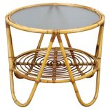 1960s Italian rattan coffee table with glass top, mid-century round design