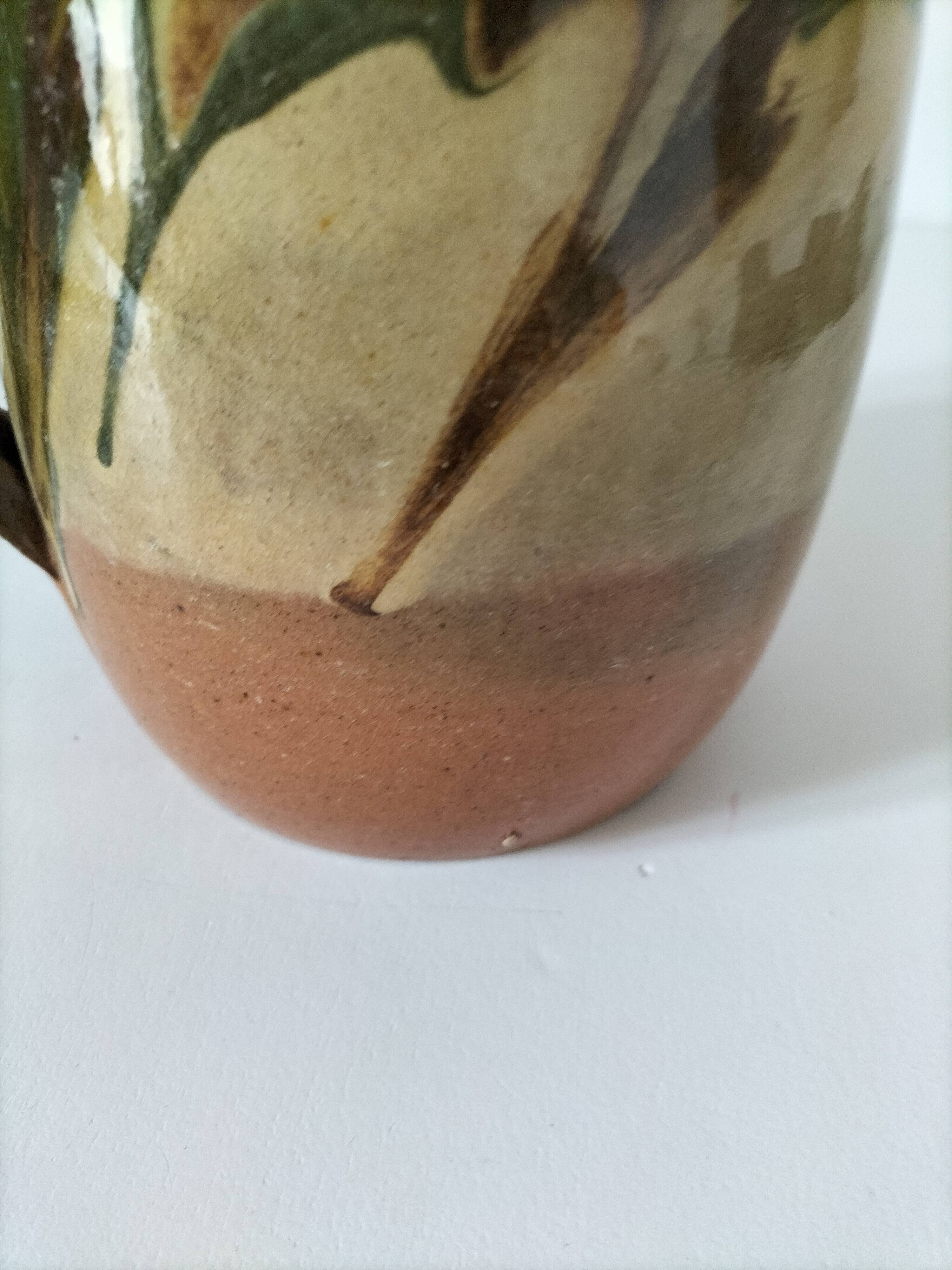 Glazed earthenware jug