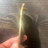 Empty brass pocket owl