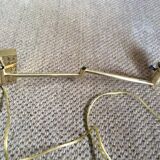 Wall lamp in gold metal