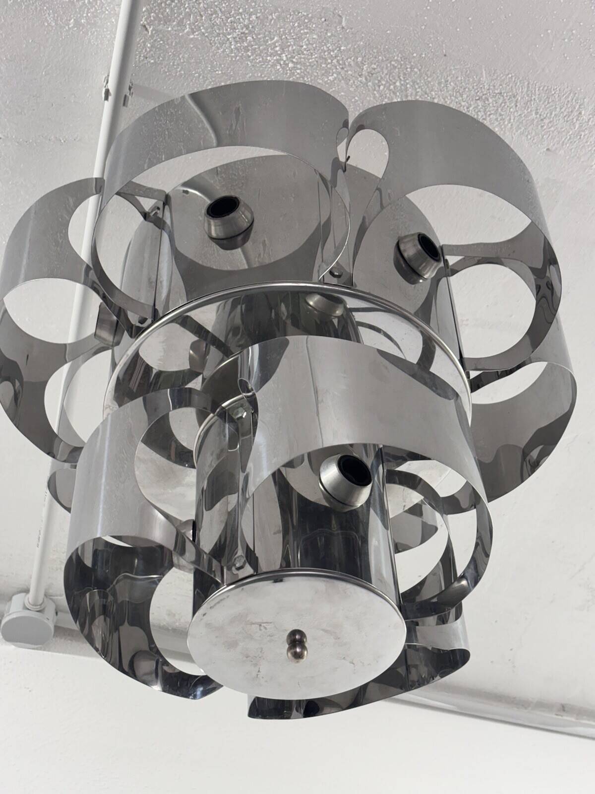 Curved steel chandelier attributed to Max Sauze, 9 lights