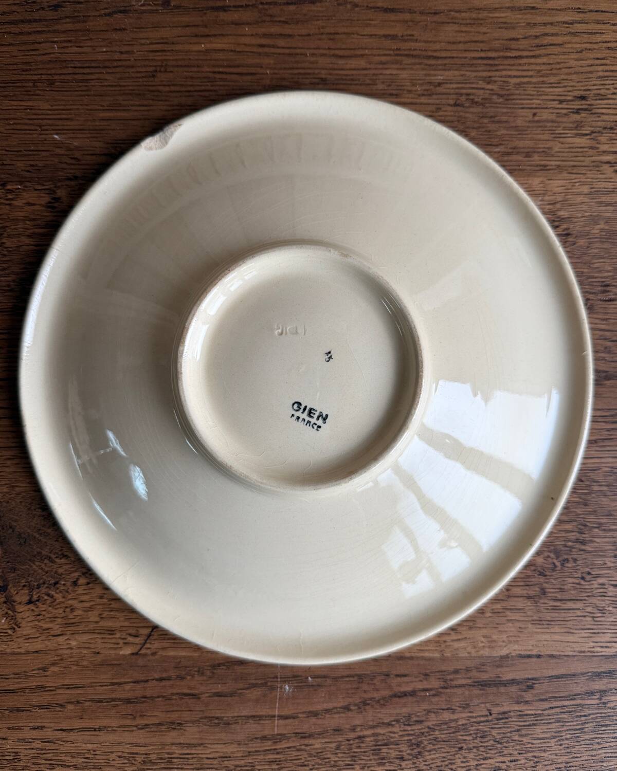 Round hollow ironstone dish from Gien