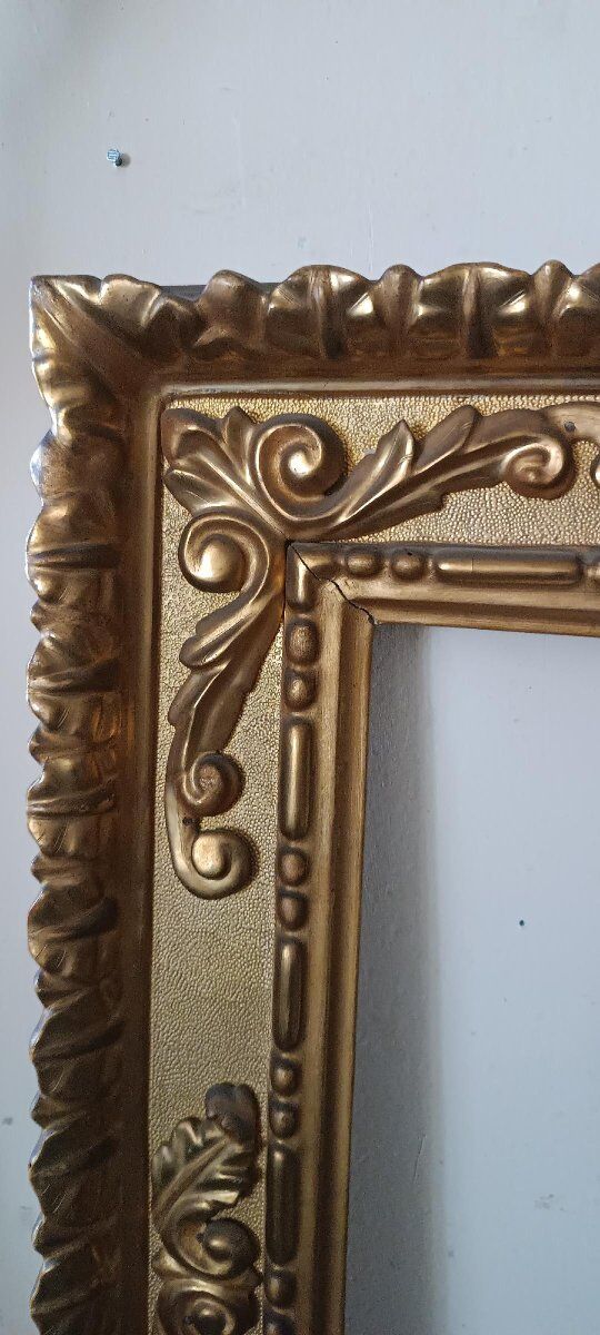 Miroir ancien en bois doré