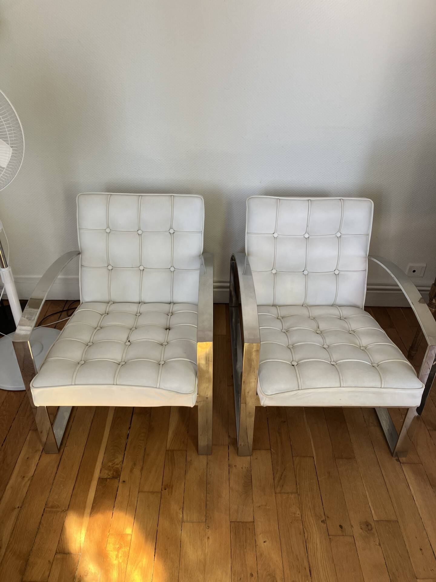 Meridiani armchair — italian design, chrome steel and tufted white leather.