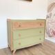 1960s commode with tapered legs.