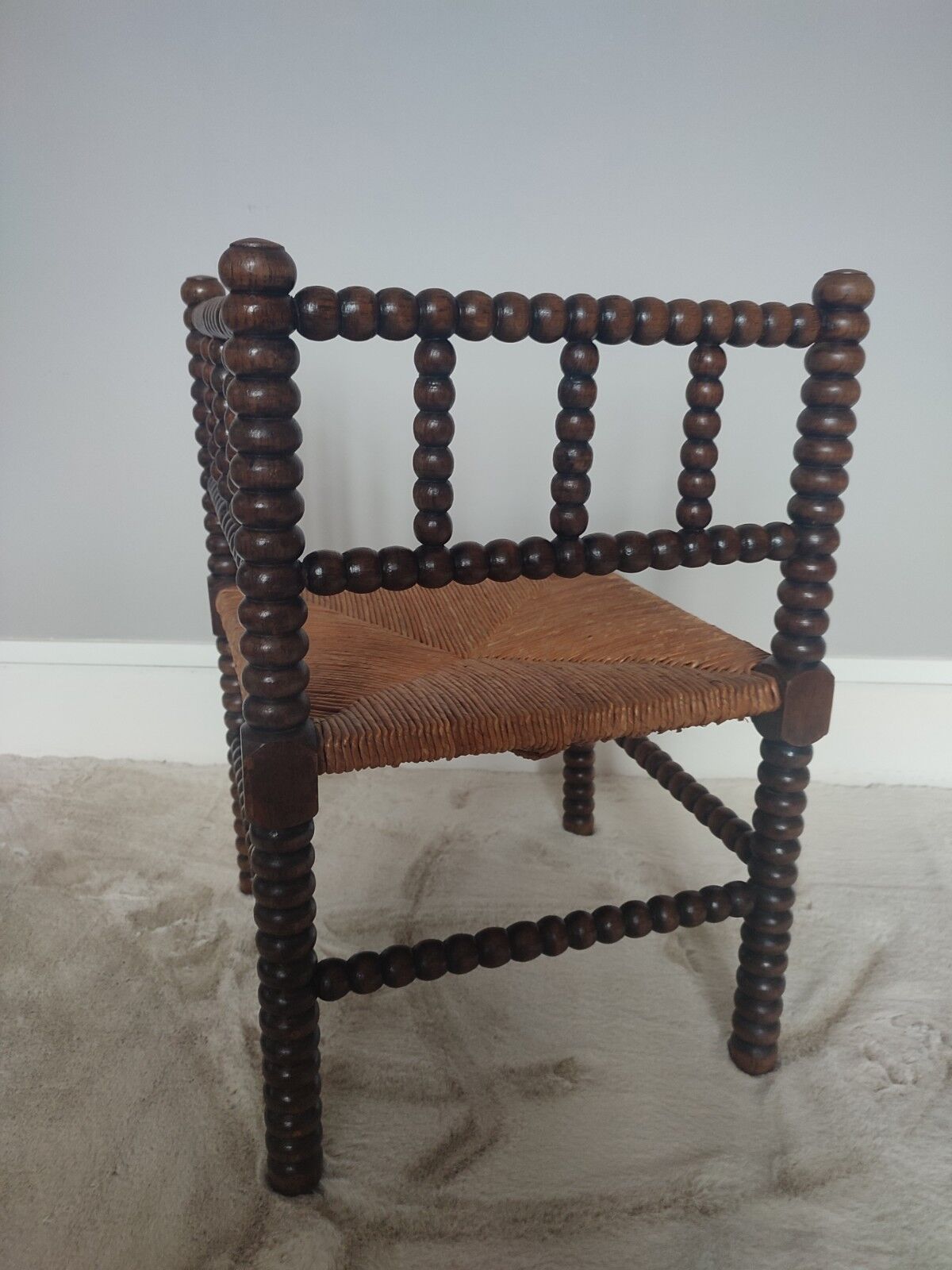 Turned wooden corner chair