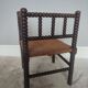 Turned wooden corner chair