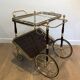 Rolling table in brass and mahogany with removable trays