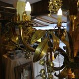 Gilded brass chandelier and silver lily of the valley bells