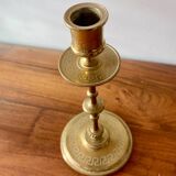Engraved brass candle holder