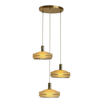 Triple cascade pendant light with vintage frosted glass globes and gold finish