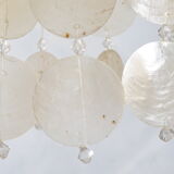 Mother-of-pearl tassels suspension