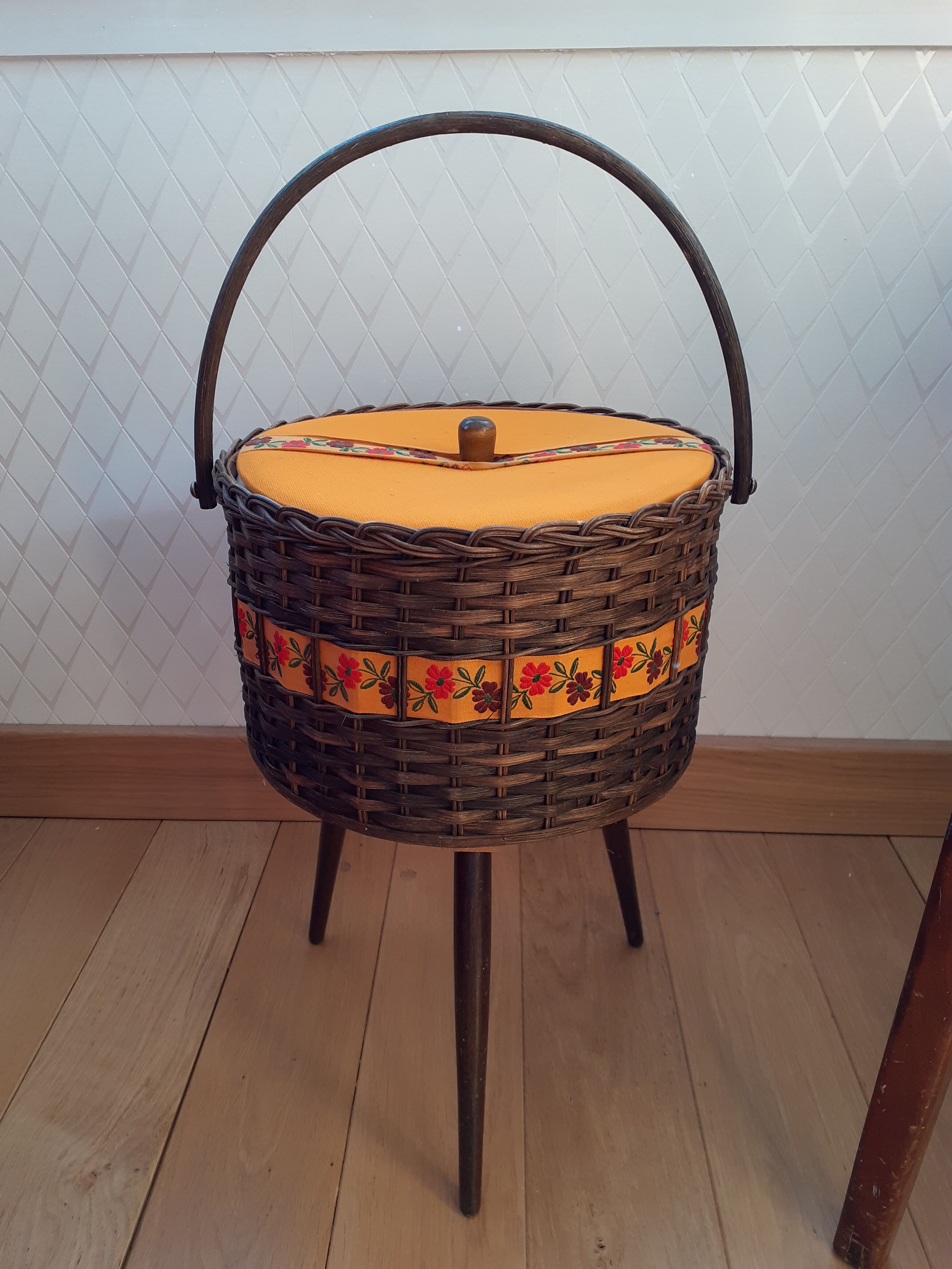 Vintage wicker worker on compass feet