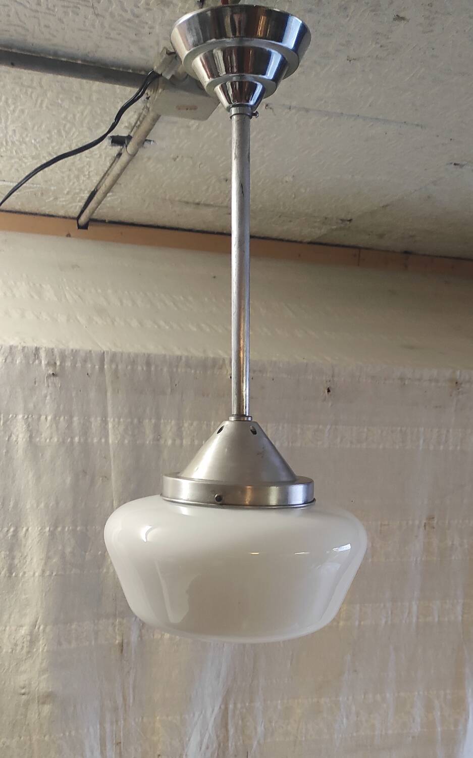 Metal Bauhaus suspension with opaline globe - mid 20th century.
