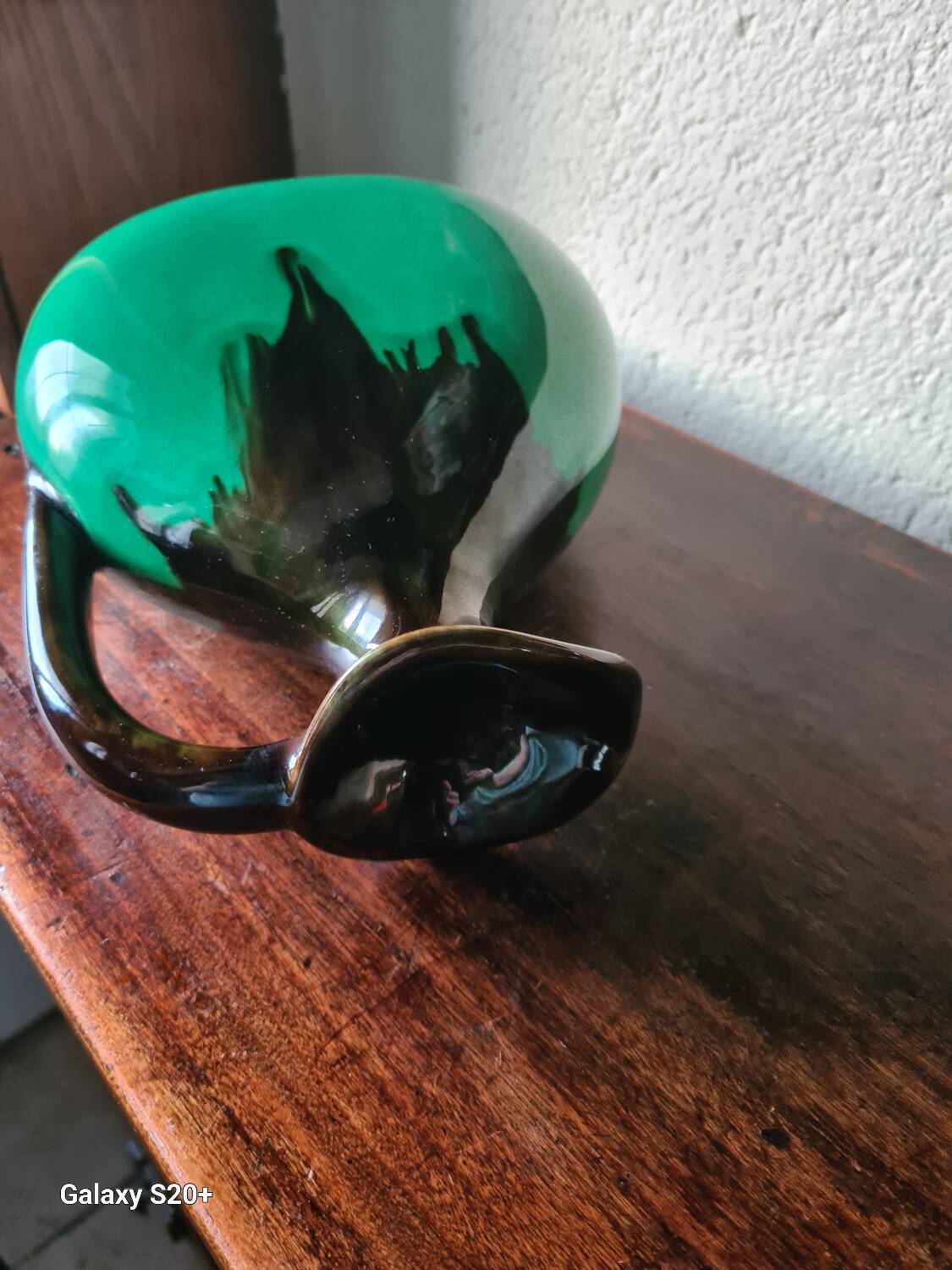 Green and brown ceramic vase