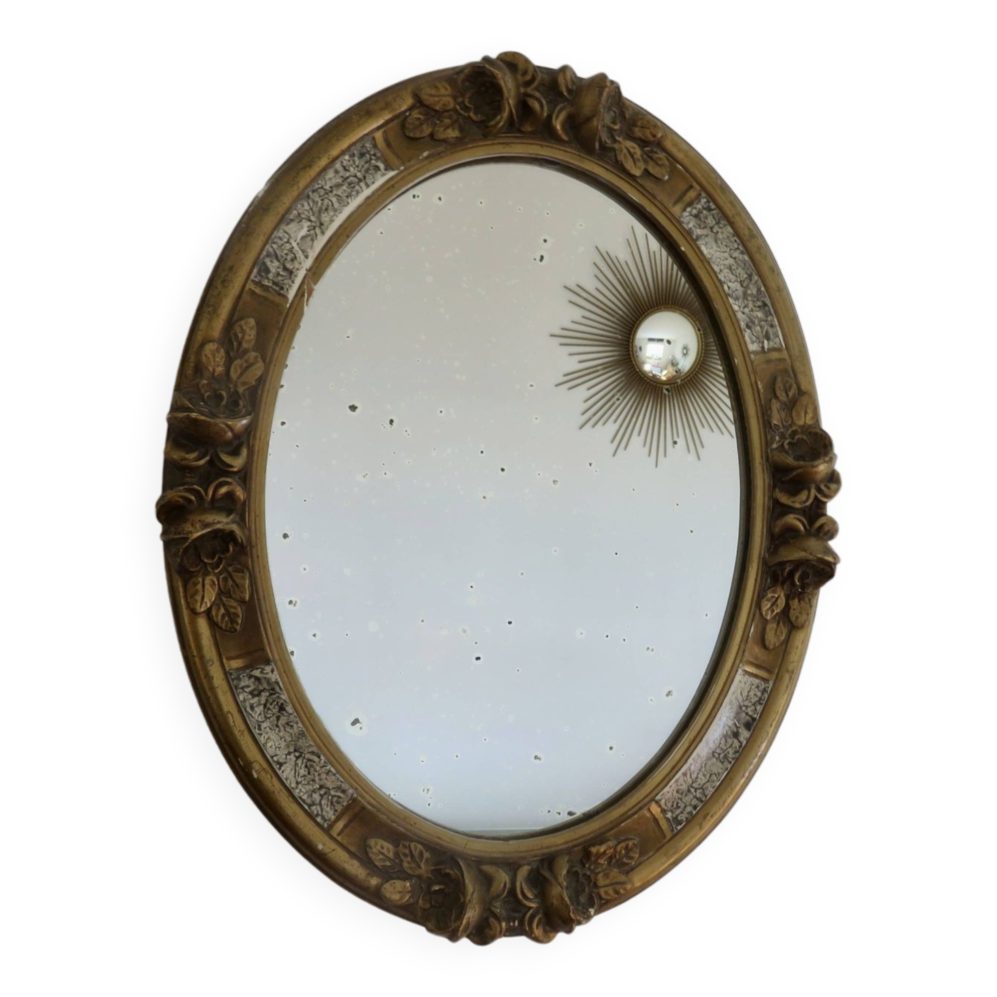 Oval wall mirror, golden floral pattern in stucco and wood, late 19th century