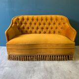 Old gold toad bench