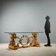 Antique coffee table in gilded wood with a glass top, Italy, 20th century.