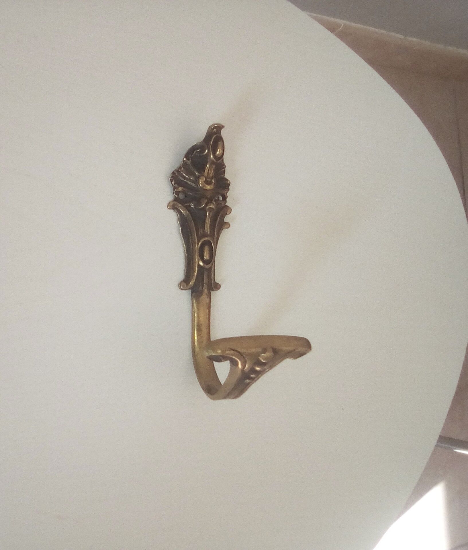 Old brass coat rack hook