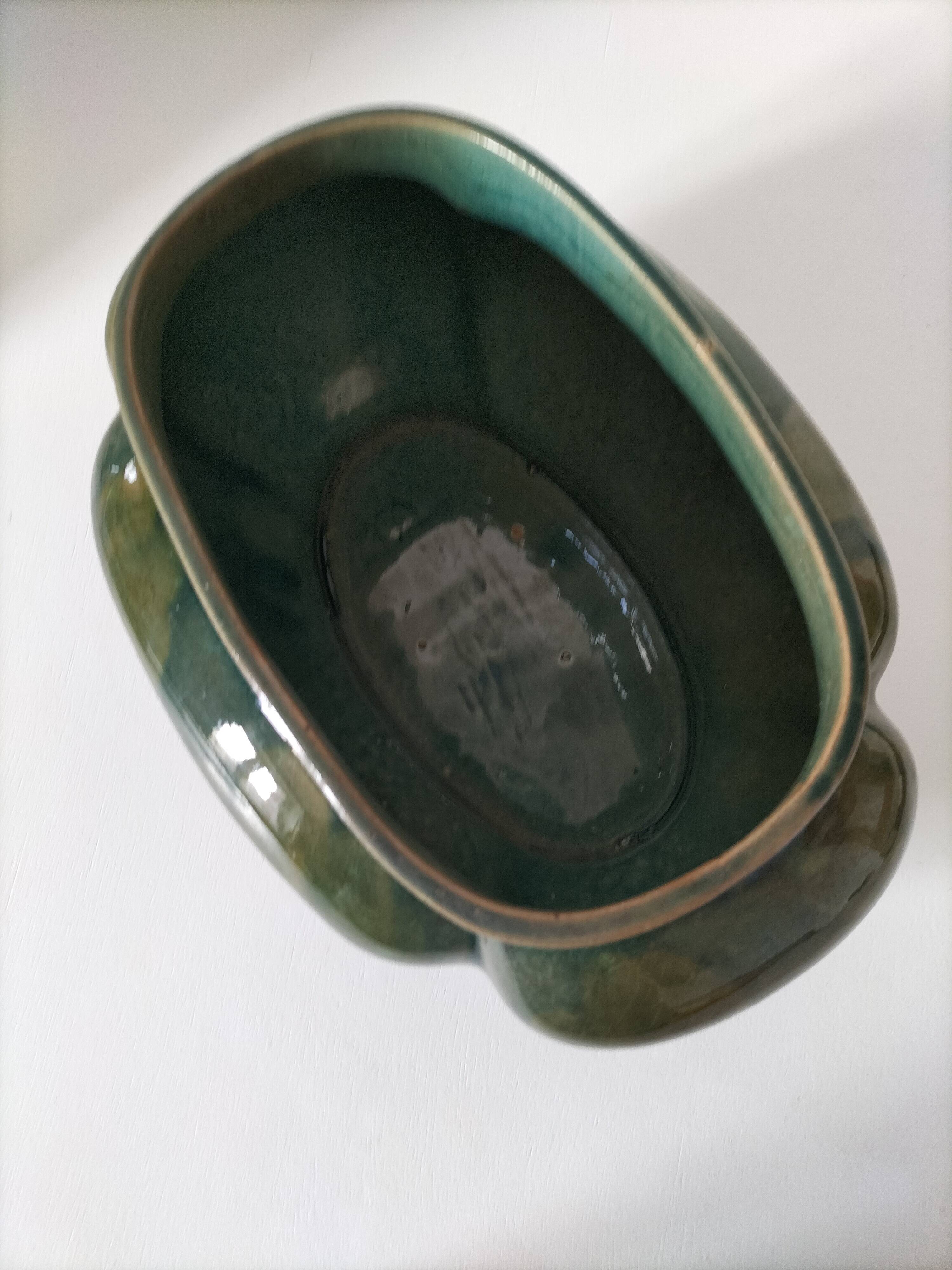 Art Deco flared cache-pot in turquoise glazed earthenware.