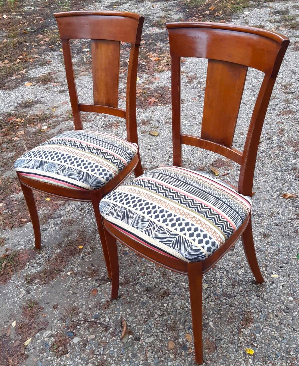 2 varnished solid wood chairs with "ethnic" padding