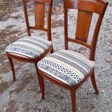 2 varnished solid wood chairs with "ethnic" padding