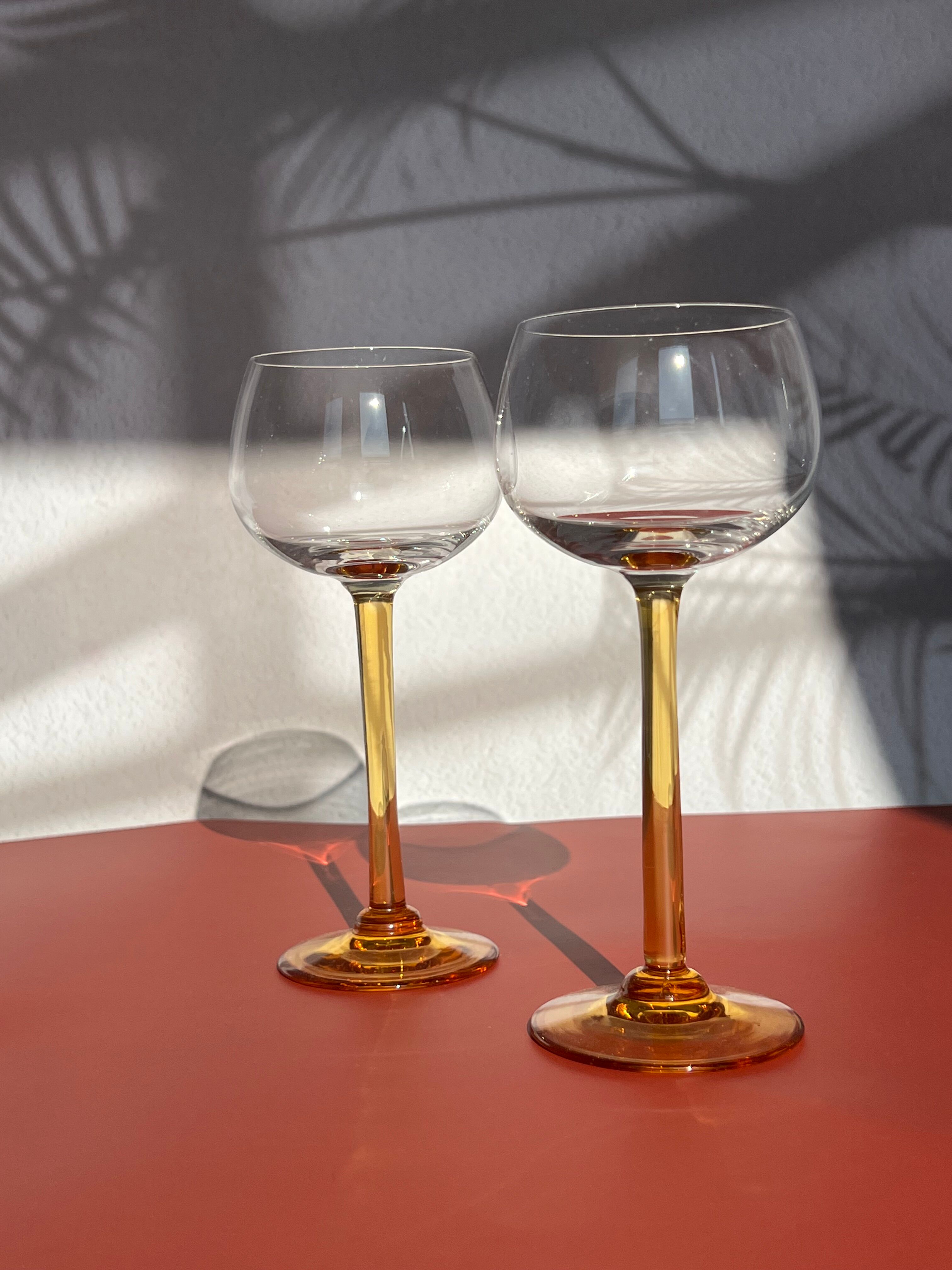 Pair of glass balloon vintage style Luminarc foot rod orange