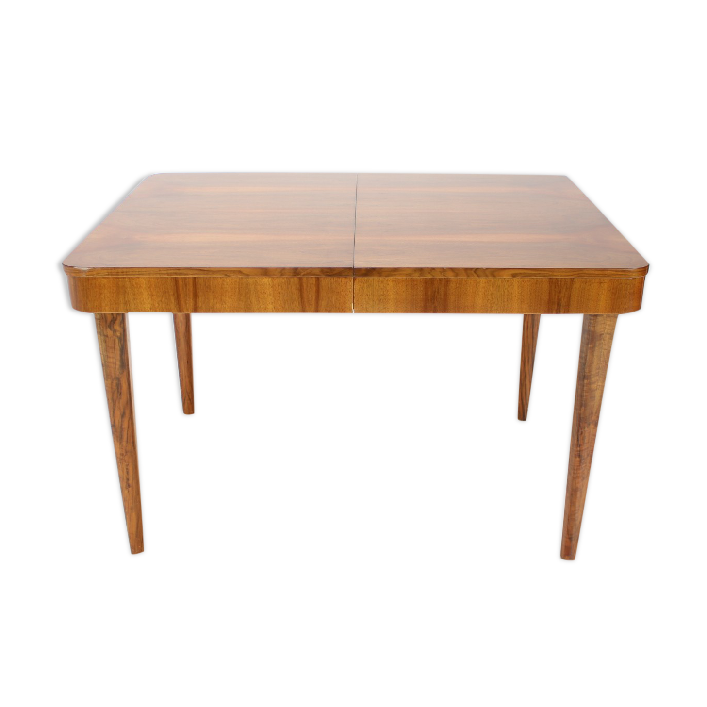 Extendable dining table designed by Jindřich Halabala for UP Závody, 1957.