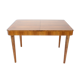 Extendable dining table designed by Jindřich Halabala for UP Závody, 1957.