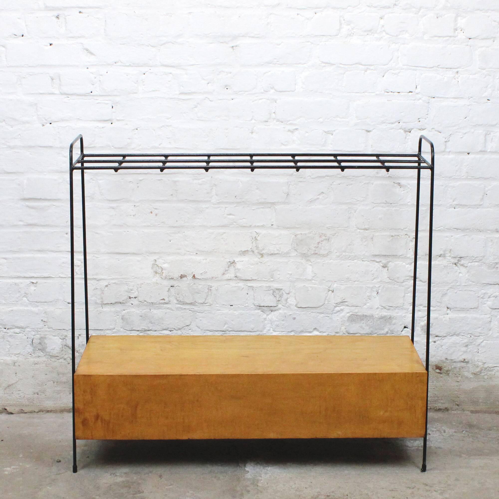 Vintage wood and lacquered metal storage unit.