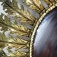 Large Italian sunburst wall mirror in gilded metal, 1960s-70s.