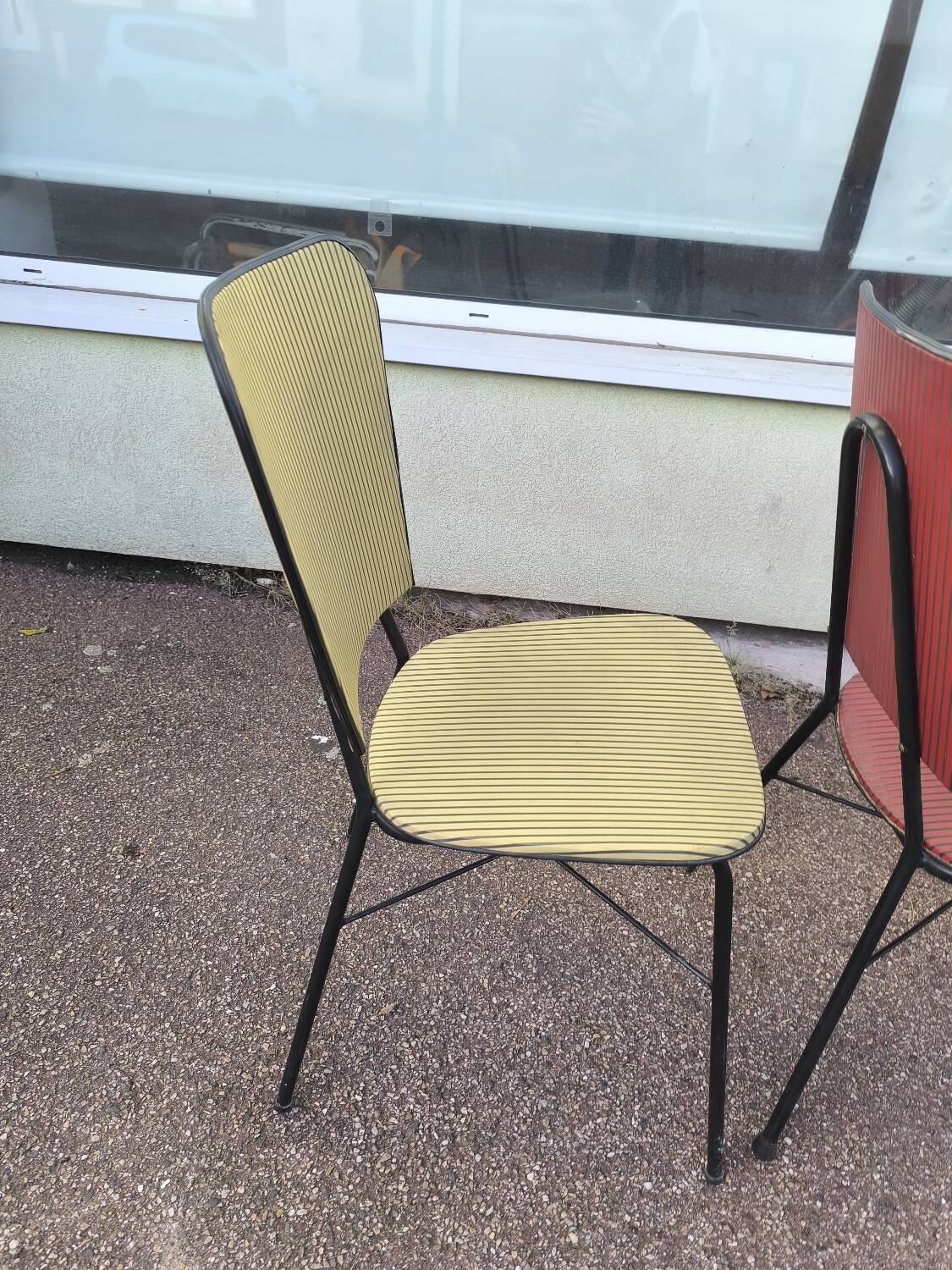 Set of 3 vintage yellow and red faux leather chairs.