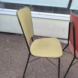 Set of 3 vintage yellow and red faux leather chairs.