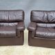 Pair of chocolate leather lounge chairs