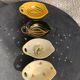 4 enameled ceramic bowls with gold or bird or flower pattern decoration, design and vintage 1950