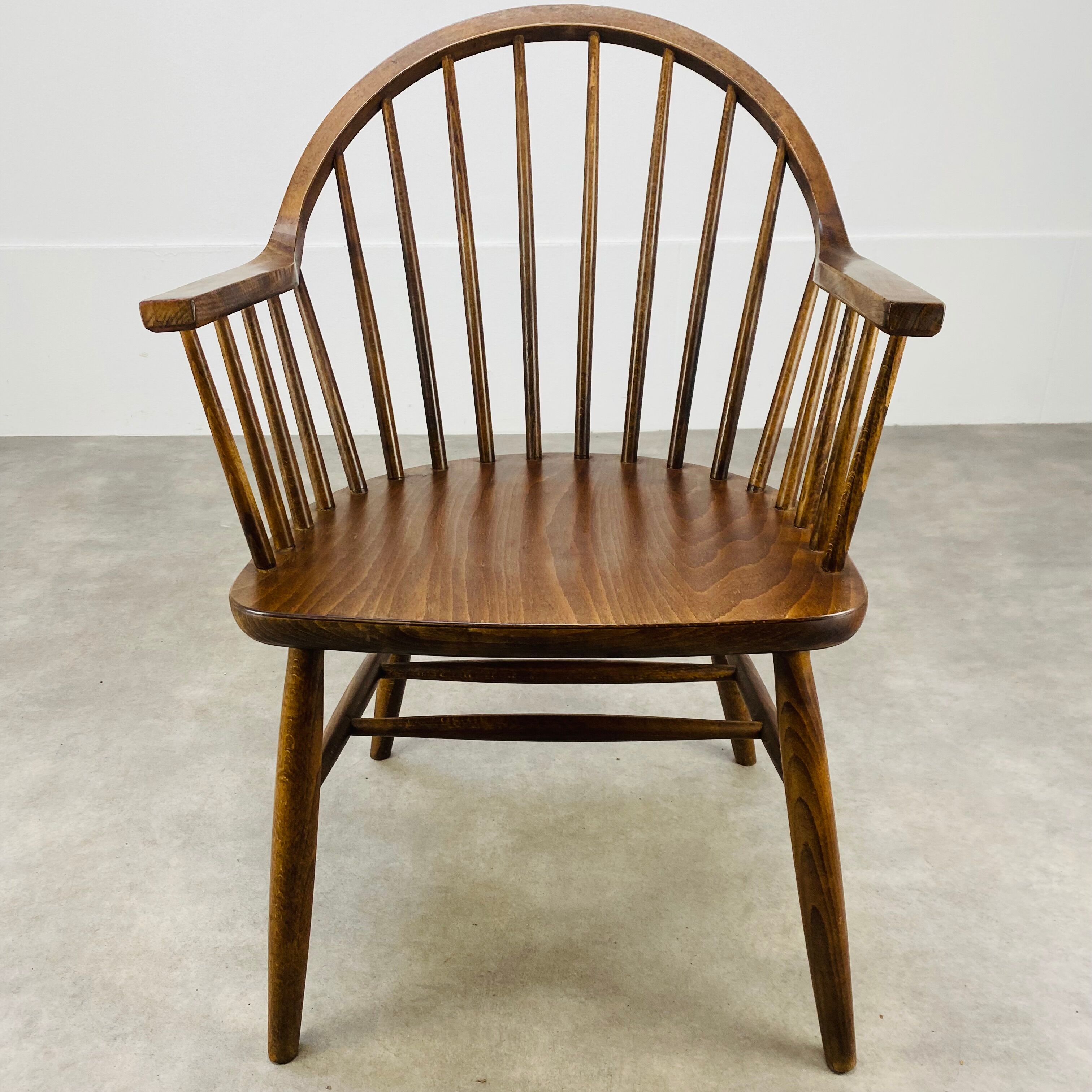 Baumann armchair with Scandinavian style bars, desk