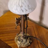 Art nouveau bronze and brass lamp