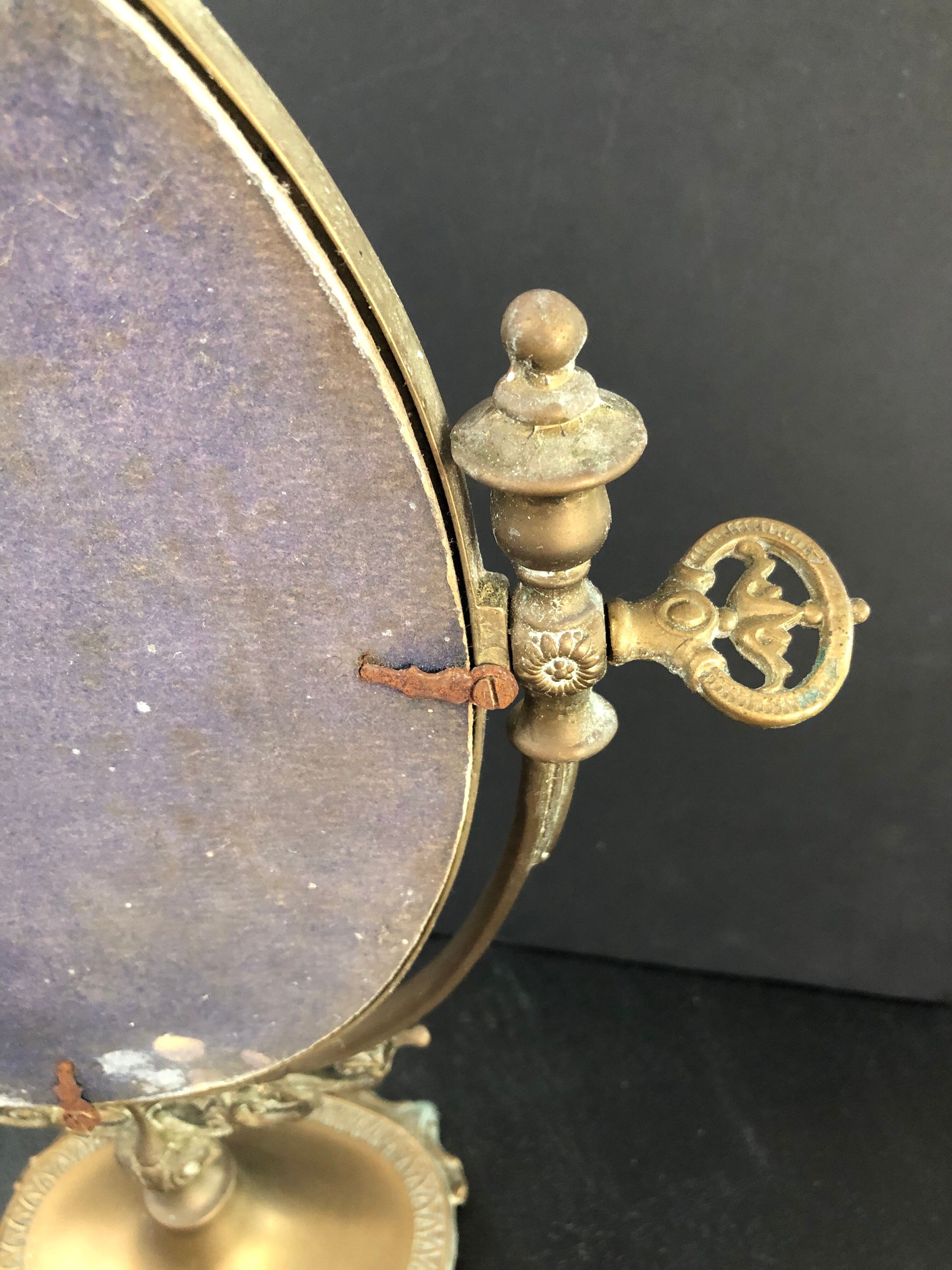 Swivel bronze mirror