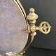 Miroir en bronze pivotant