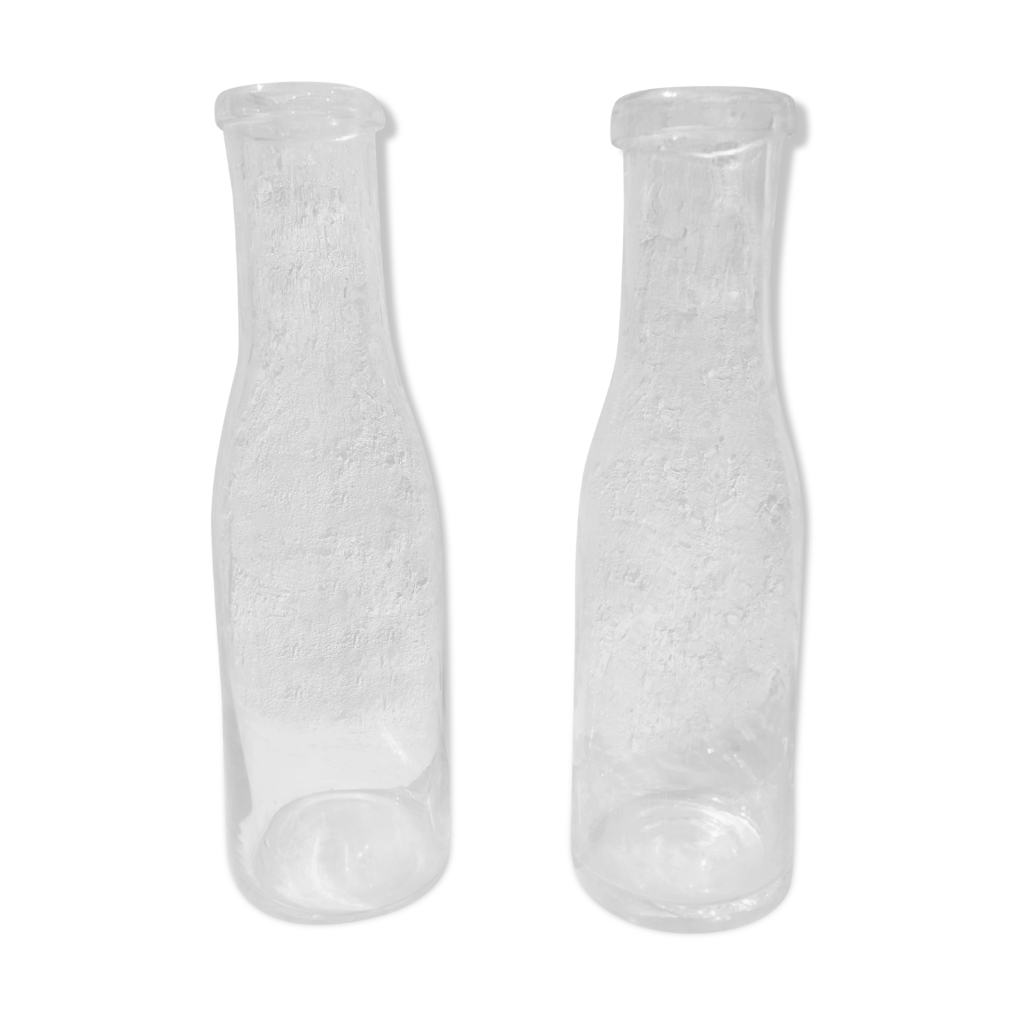 Pair of old milk bottles