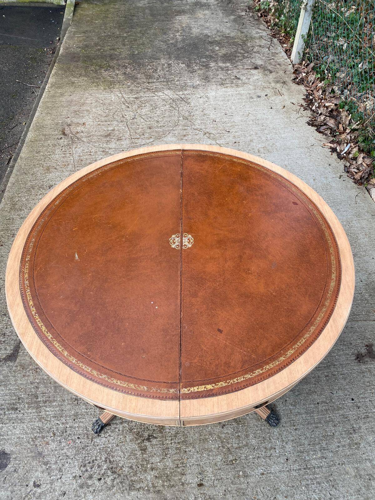 Round extendable table in Empire style, renovated with Bordeaux leather and raw wood, 168cm.