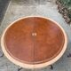 Round extendable table in Empire style, renovated with Bordeaux leather and raw wood, 168cm.