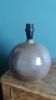 Lamp base ball signed Eric Debruyne in greige, brown, taupe colours.